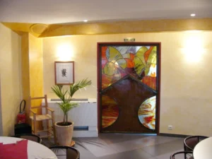 "Flamenca" Porte métal oxydé / vitrail